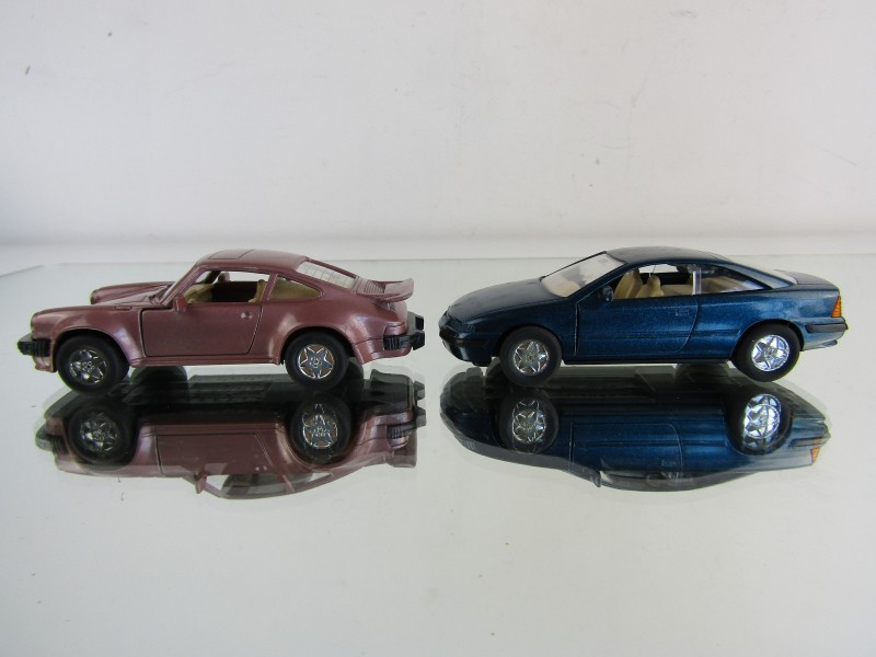 2 Schaalmodellen: Welly, Porsche + Opel Calibra