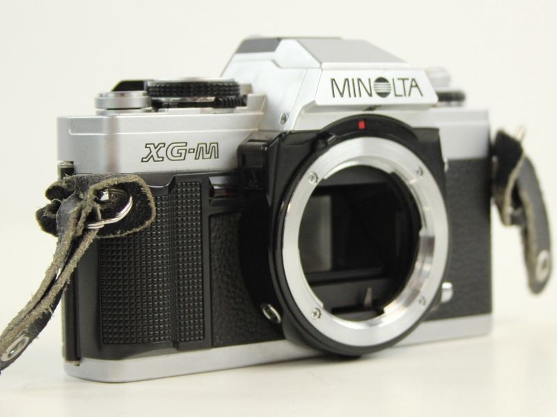 Minolta Xg-M camera met 200mm en 35-70 mm lens