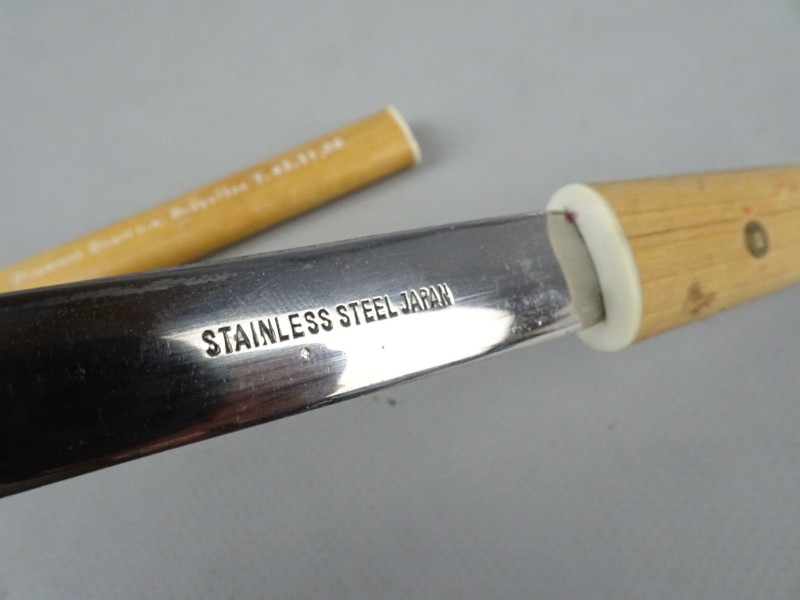 Stainless steel brievenopener made in Japan.