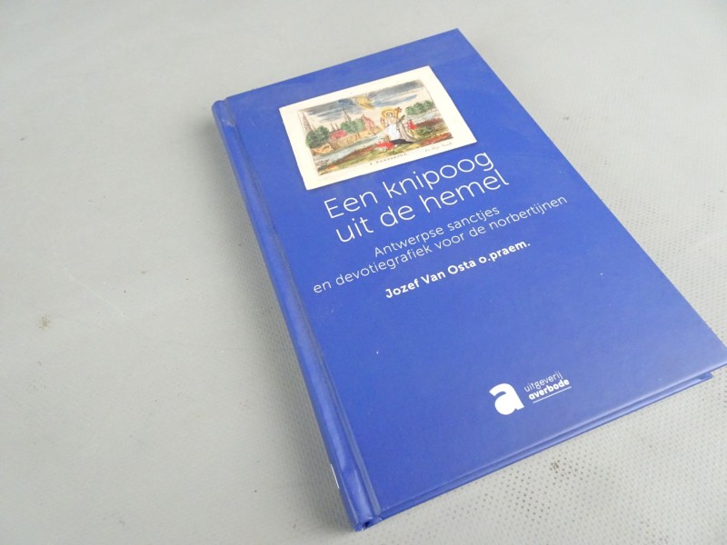 Boek "Een knipoog uit de hemel" van Jozef Van Osta o.praem 239p in hardcover