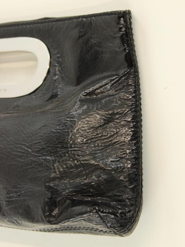 Vintage zwarte clutch uit lakleder, gemerkt Michael Kors