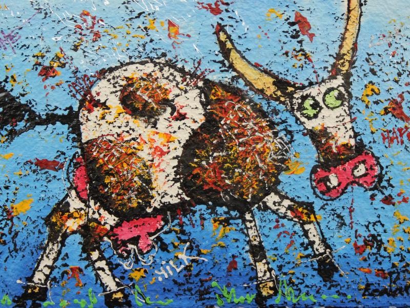 Bonte koeien: CowParade 'Sunny Day Cow' & schilderij koe