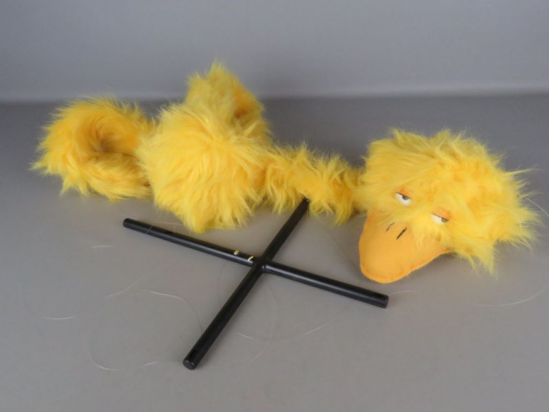 Marionet van geel vogel