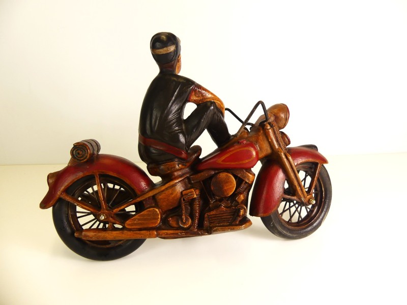 Vintage man beeld op - Harley Davidson - motorfiets