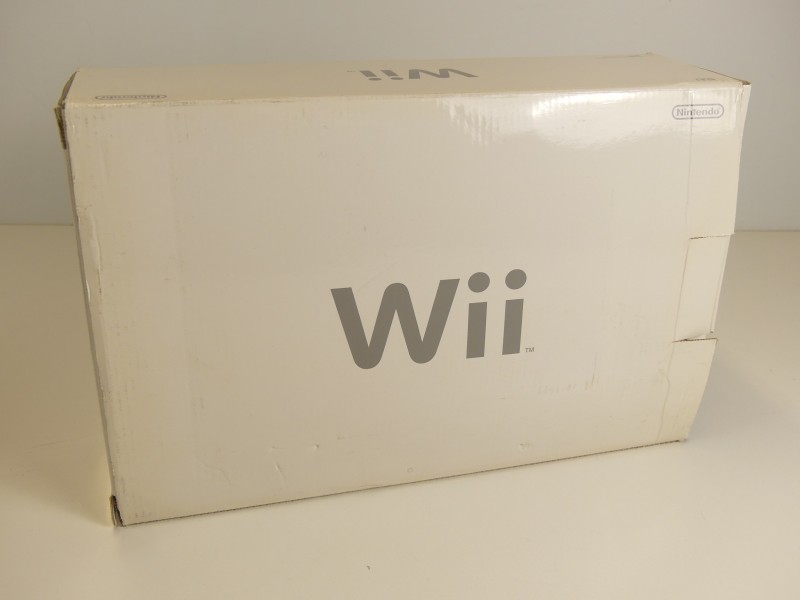 Wii console met accessoires en WiiFit Board + spelletjes
