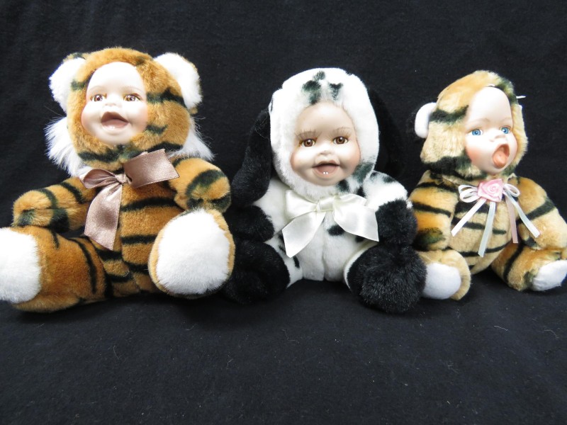Drie vintage baby's poppen
