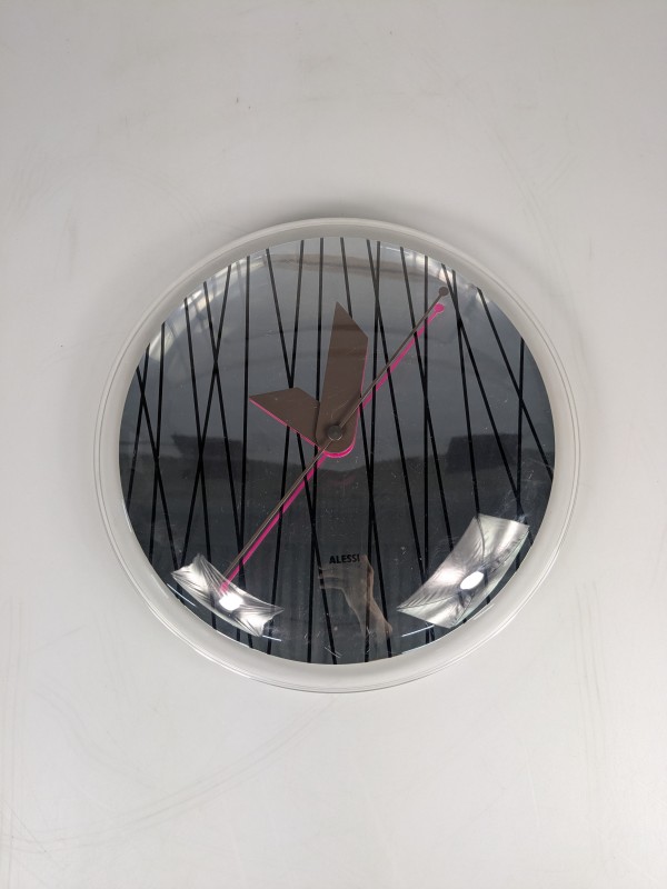 Alessi Sole-Rays wandklok ontworpen door Allesandro Mendinii