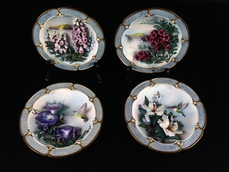 Set van vier porseleinen wandborden