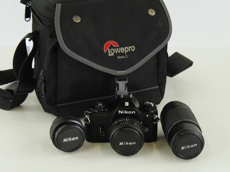 Nikon EM 35mm Spiegelreflexcamera Set met 28mm, 50mm en 75–150mm Lens + Lowepro Nova 2 Tas