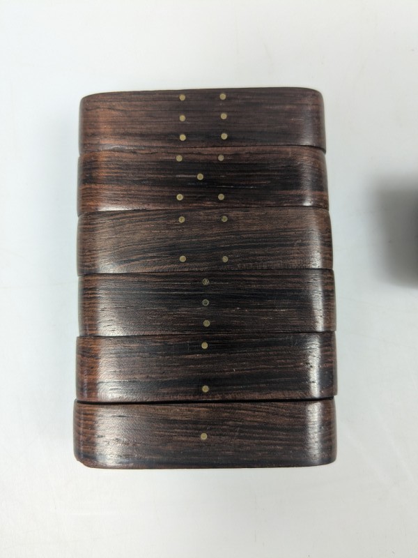 Set van 8 design servetringen – Preben Kragh voor Illums Bolighus – palissander & messing – Denemarken, jaren 1960
