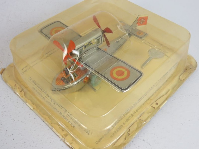 Vintage toy: Opwindbaar vliegtuig met sleuteltje.