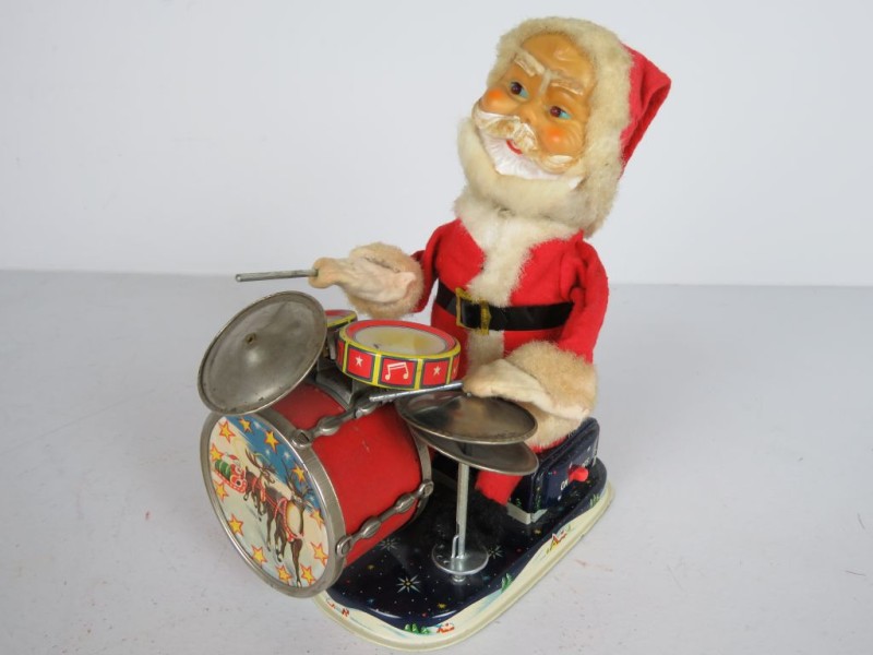 Vintage blikken speelgoed: Kerstman met drum.