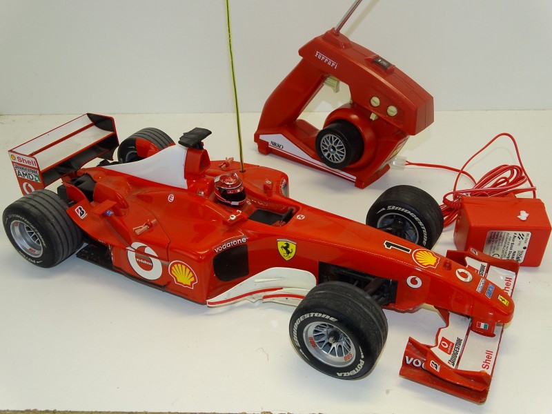 FORMULA 1 FERRARI A RADIO CONTROL 1:24 ART.3493 - Algo Grosso - Juguetería